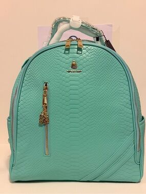 NWT Tote & Carry Turquoise Women’s Backpack Vegan Leather